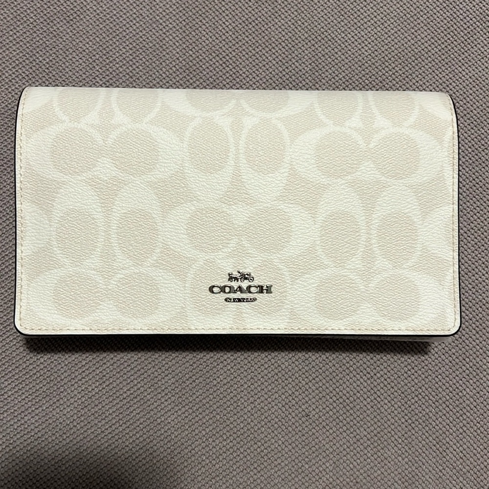 Authentic Coach crossbody , never used will come just as pictured